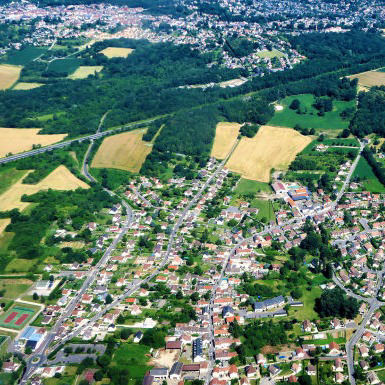 Aerial view over a town shows land available for building with the MAAP hybrid modular system
